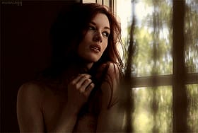 Redhead Stoya Gets Naked and Shows Off Her Tits'