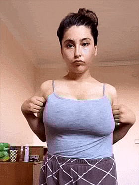 Busty Brunette Amateur Gives You a Close-Up of Her Big Tits'
