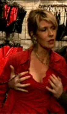 Blonde Mature Woman Groped in Clothing Store picture 1 of 1