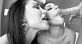 Two hot chicks giving each other a messy cumshot'