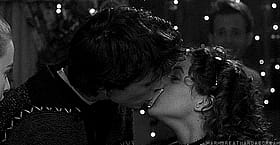 Sexy Time: Two People Kissing in the Dark'