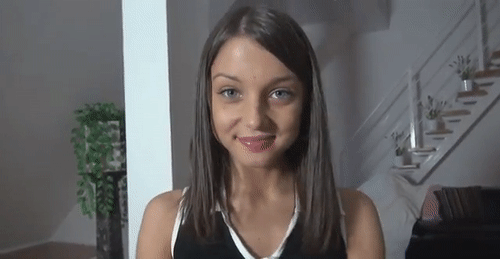 Babes in Black: Brunette Beauty Smiling for the Camera picture 1 of 1
