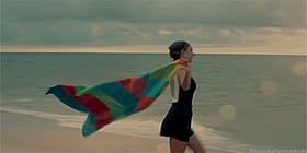 Sexy Babe Flies Kite on Beach'
