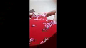 Pussy Selfshot: A Sizzling Hot Selfie of a Woman in a Red Dress'
