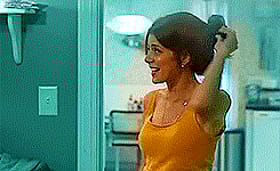 Marisa Tomei's Brunette Celebrity Non-Nude: A GIF of a Woman Brushing Her Hair'