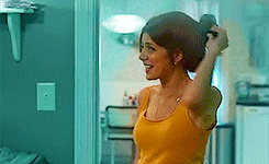 Marisa Tomei's Brunette Celebrity Non-Nude: A GIF of a Woman Brushing Her Hair picture 1 of 1