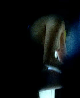 Sneak a Peek: A Keyhole View of a Naked Woman'