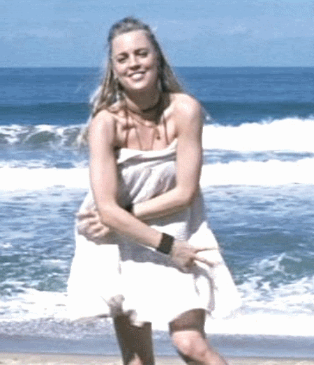 Hot Celebrity Babe Poses on the Beach in a White Dress picture 1 of 1