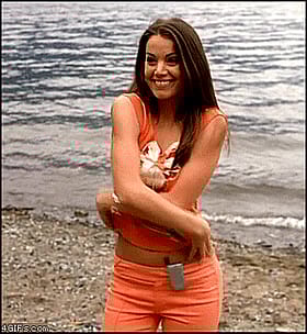 Teen Smiles for the Camera in Orange Pants'
