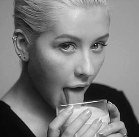 Christina Aguilera Teases with Her Tongue in a Non-Nude Scene'