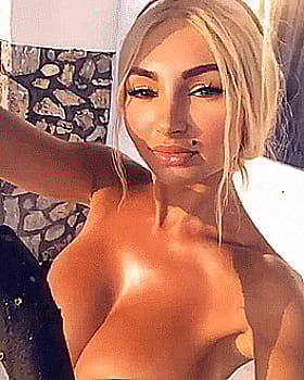 Blonde Babe with Big Tits Goes Nude'