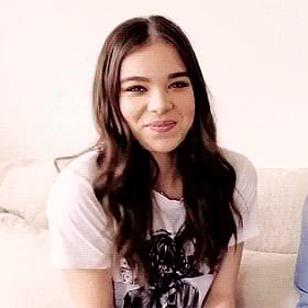 Hailee Steinfeld's Brunette Beauty: A Celebrity's Sultry Smile'