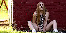 Redheaded Masturbation: A Handjob in the Grass'