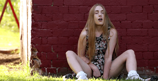 Redheaded Masturbation: A Handjob in the Grass picture 1 of 1