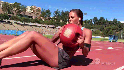 Fitness Chick Crushes Abs Workout on the Track picture 1 of 1