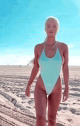 Babe in a One-Piece Swimsuit on the Beach'
