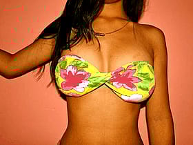 Busty Babe in Yellow and Green Swimsuit'