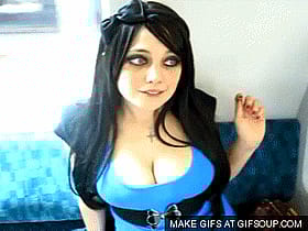 Hannah Minx's Sultry Blue Dress: A Glimpse of Erotic Seduction'