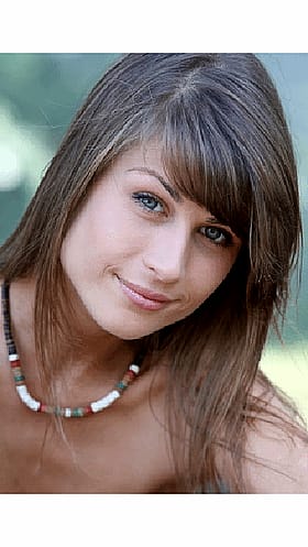 Brunette Babe Smiling for the Camera'