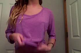 Purple shirt girl showing her boobs'