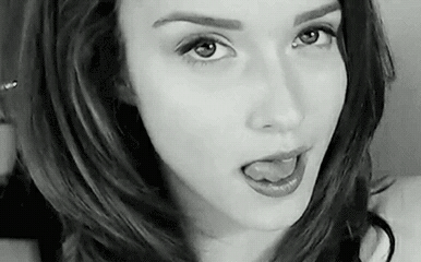 Hot Brunette Giving You a Taste of Her Tongue picture 1 of 1
