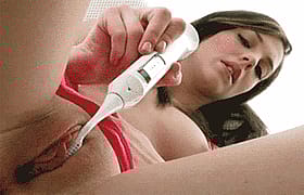 Sexy Brunette Masturbating with a Toothbrush'