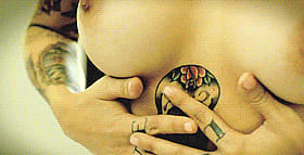 Hardcore Nude Tattooed Babe Exposes Her Boobs'