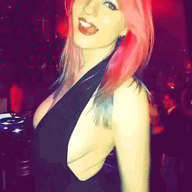 Babes with Big Tits: Pink Hair, Red Lips, and a Tight Dress'