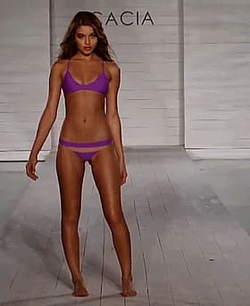 Nice Butt Alert: Check Out This Model's Booty in Purple Bikini'