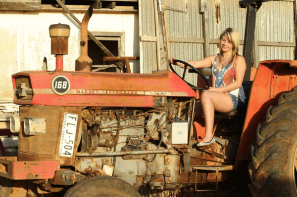 Amateur Big Tits Pussy: A Rusty Red Tractor Ride picture 1 of 1