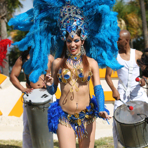 Brazilian Carnival Dancer in Blue Feathered Headdress picture 1 of 1