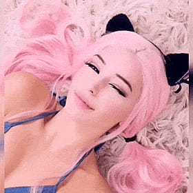 Pink-haired Teen in Ahegao Cosplay Lays on White Rug'