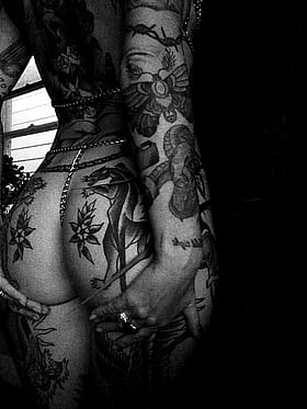 Ink Ass: A Tattooed Temptress's Tantalizing Tease'