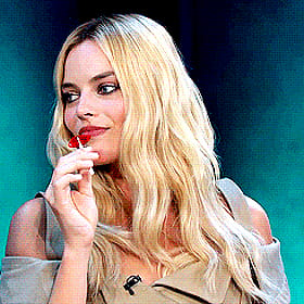 Aussie Blonde Celebrity Margot Robbie Licks Red Lollipop'