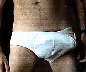 Penis Bulge in White Underwear: A Man's Exposed Erotic Moment'