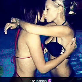 Amateur Lesbian Kissing: Two Hot Chicks Locking Lips in the Pool'