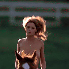 Betsy Russell's Topless Horse Ride'