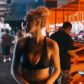 Blonde Amateur Big Tits Show Off in Arcade'