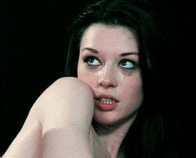 Stoya's Sultry Stare: Erotic Expression and Intense Eye Contact'