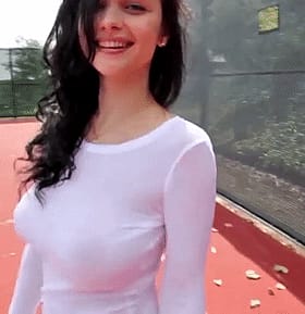 Babes with Big Tits: Brunette Bombshell Smiling for the Camera'