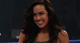 AJ Lee's Sultry Brunette Smile: A Celebrity's Erotic Seduction'