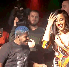 Cardi B's Motorboat Ride: Celebrity Non-Nude Fun'