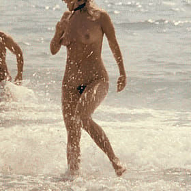 Hairy Nude Beach Babe Strolls in the Ocean'