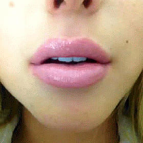 Pussy Lips: A Close-Up of a Woman's Mouth'