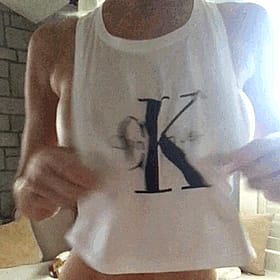 Big Tits Babe Flashes Her KKK'